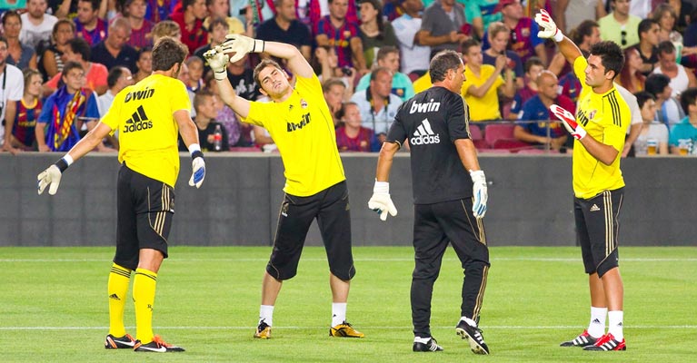 Goalkeepers warming up for a game