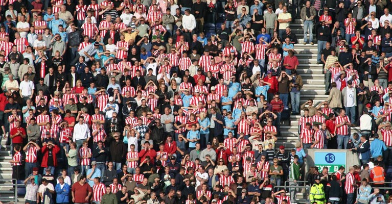 A stadium of football fans
