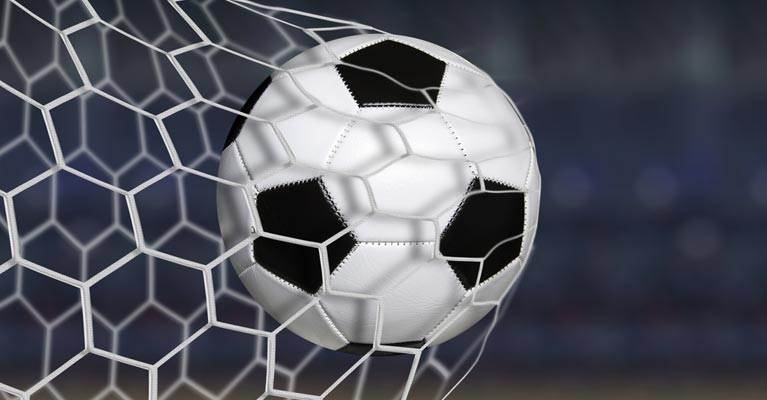 football in the back of the net