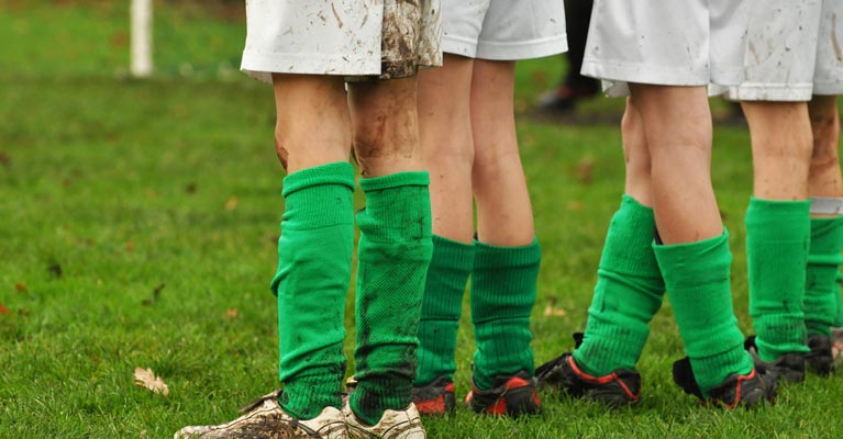 Legs of kids football team