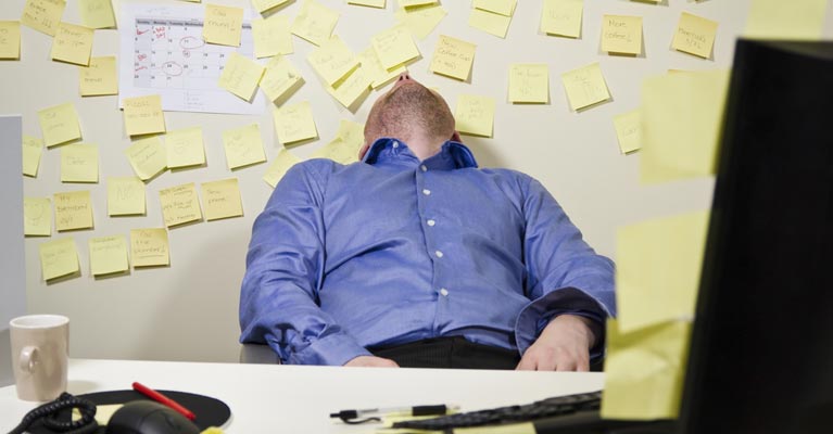 Soccer coach sitting in his chair